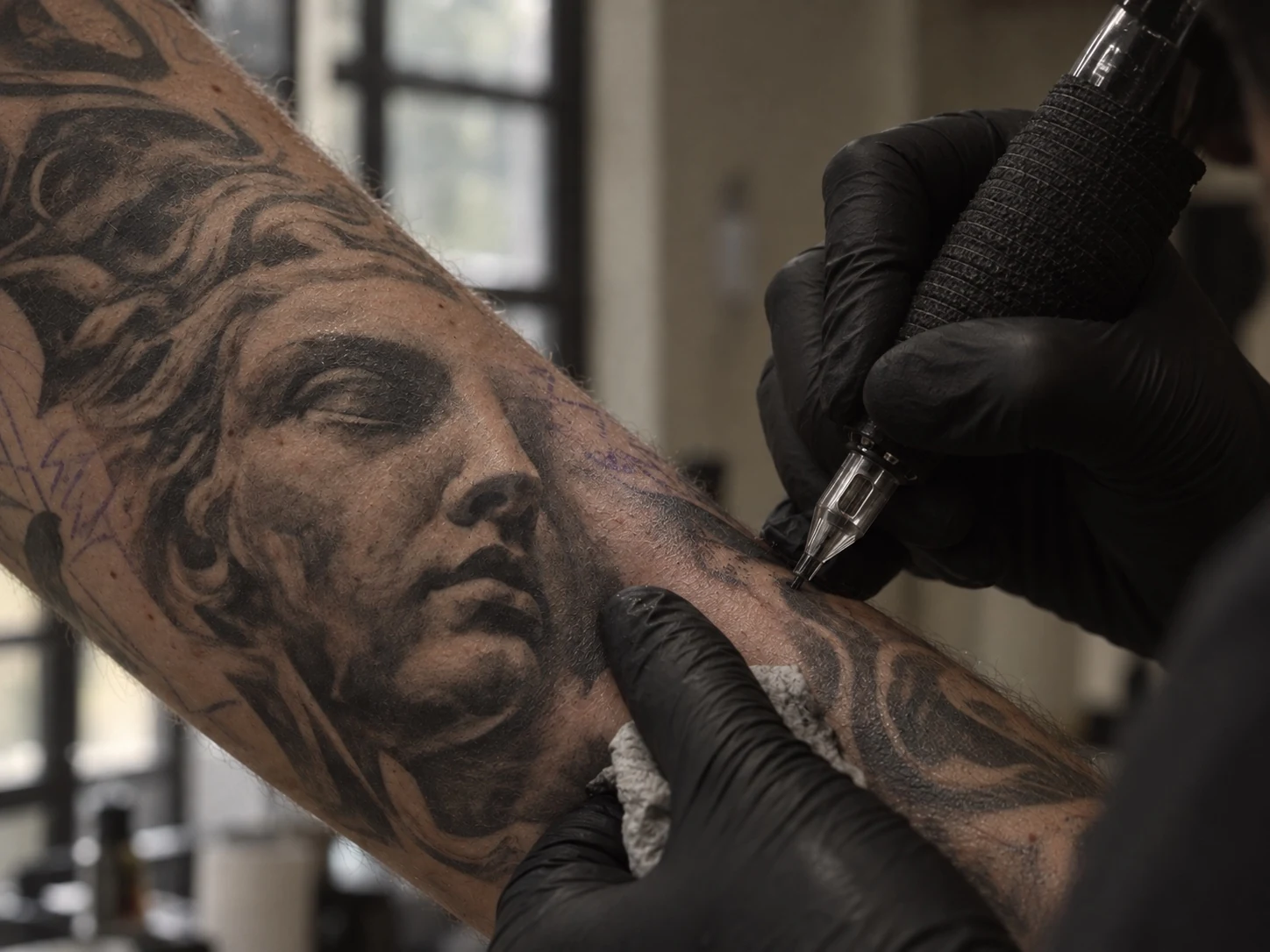 Detail of tattoo application